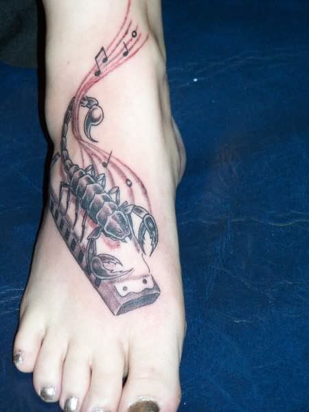 scorpion tattoo with music tattoo on foot tattoo designs for girls