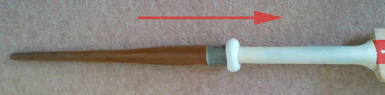 How do you put a new grip on a cricket bat?