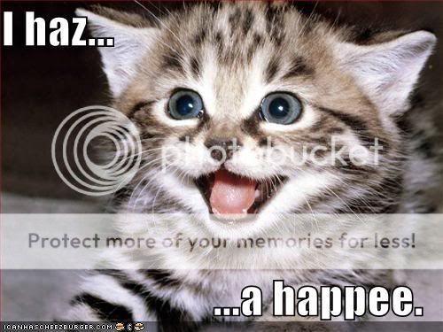 http://i195.photobucket.com/albums/z13/triplike_i_do/cats/happee.jpg